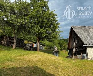 Na predaj rodinný dom s veľkým pozemkom – Vyhne, časť Peserany